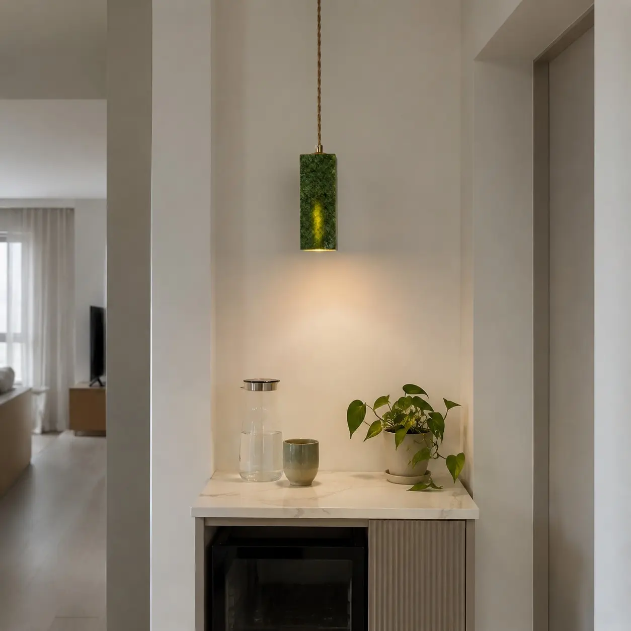 Green jade pendant light in an entryway