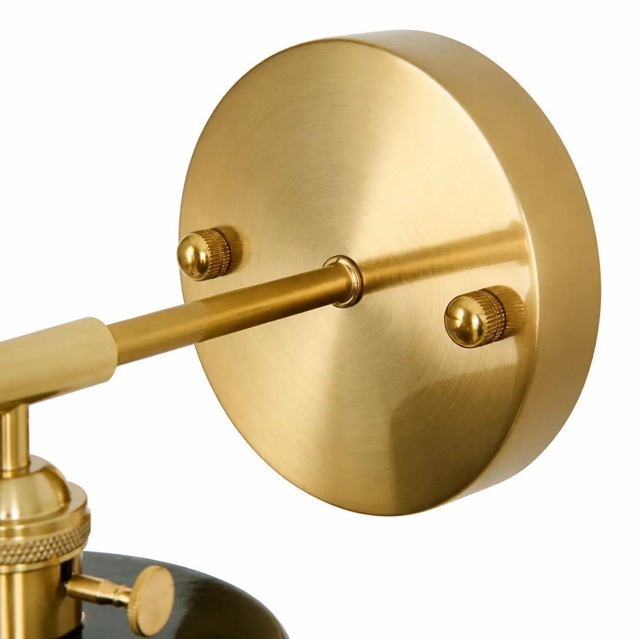 Brass wall plate and arm detail