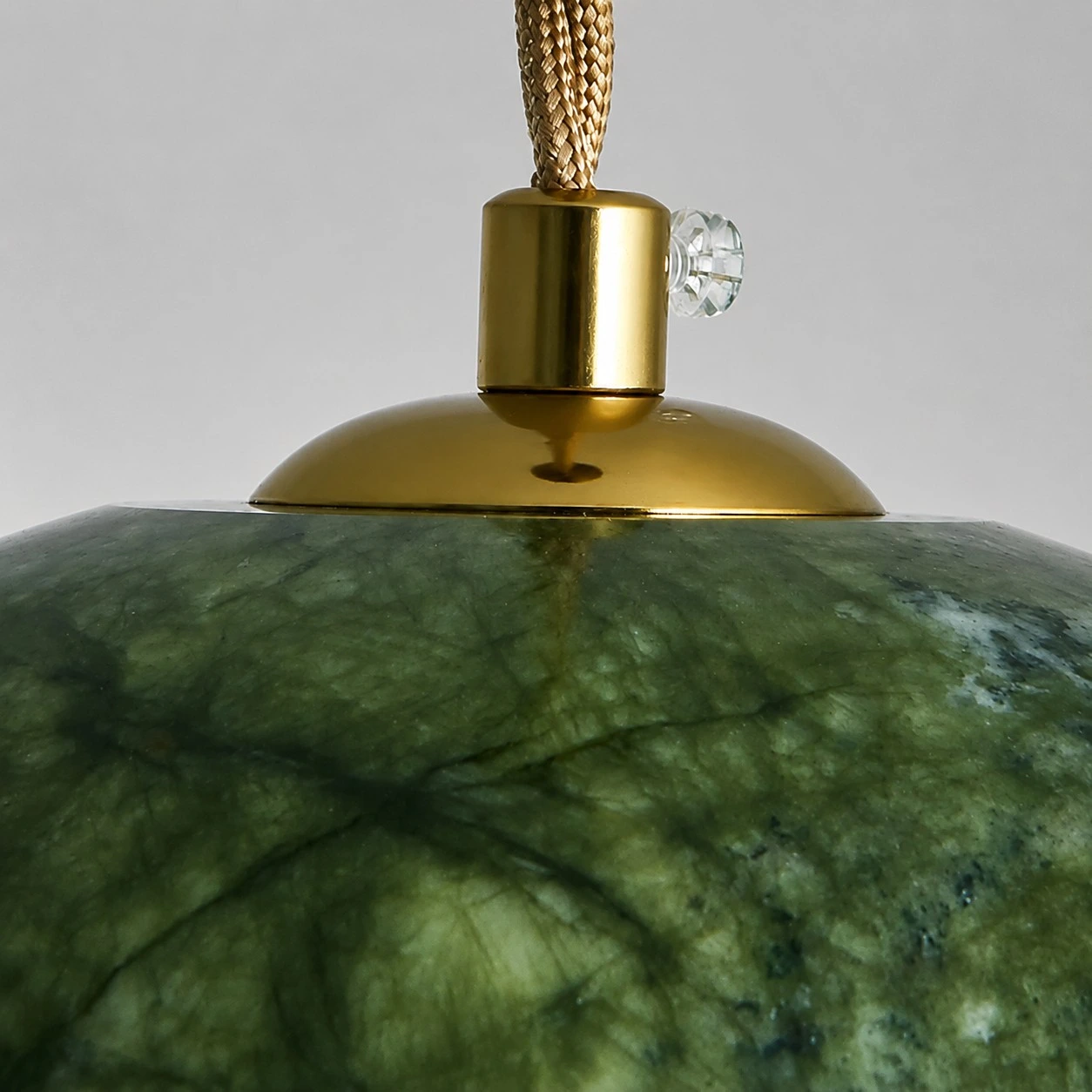 Close view of the brass-tone shade fitting